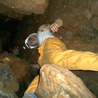 Person exploring Swartkranz Cave