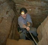 Person abseiling into Swartkranz Cave